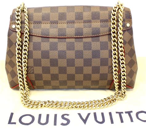 louis vuitton damier clutch.